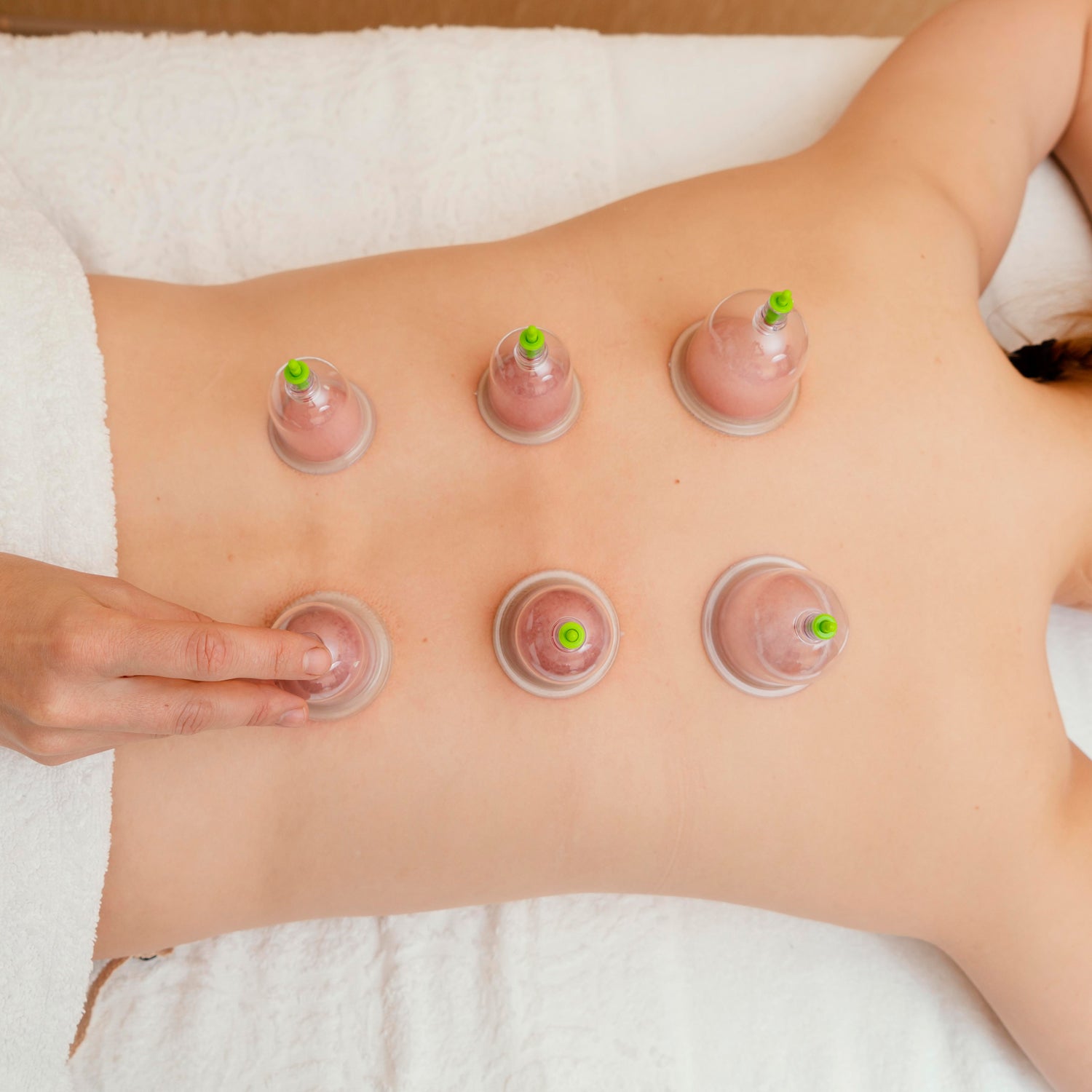 Cupping therapy kit with six suction cups for muscle relief and relaxation. Cupping therapy kit with six suction cups for muscle relief and relaxation.